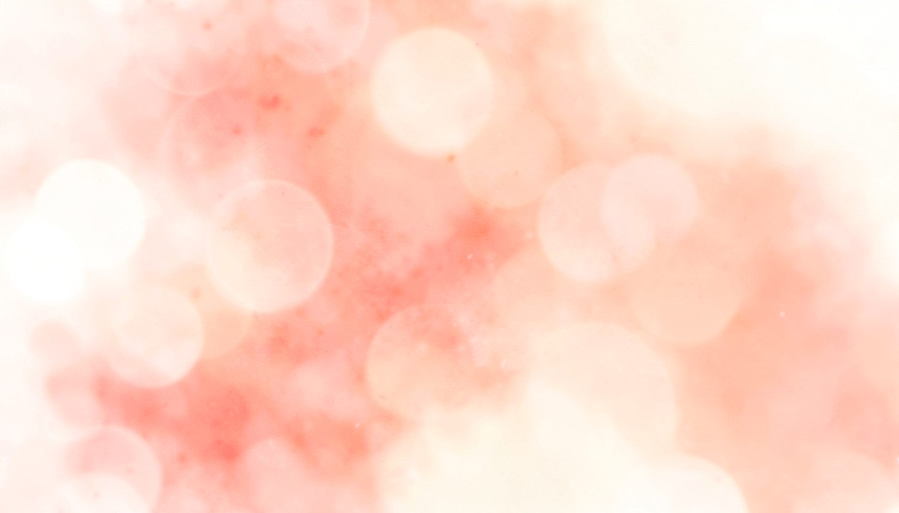 Warm rose and cream abstract wash with soft blurred bokeh, gentle and inviting mood